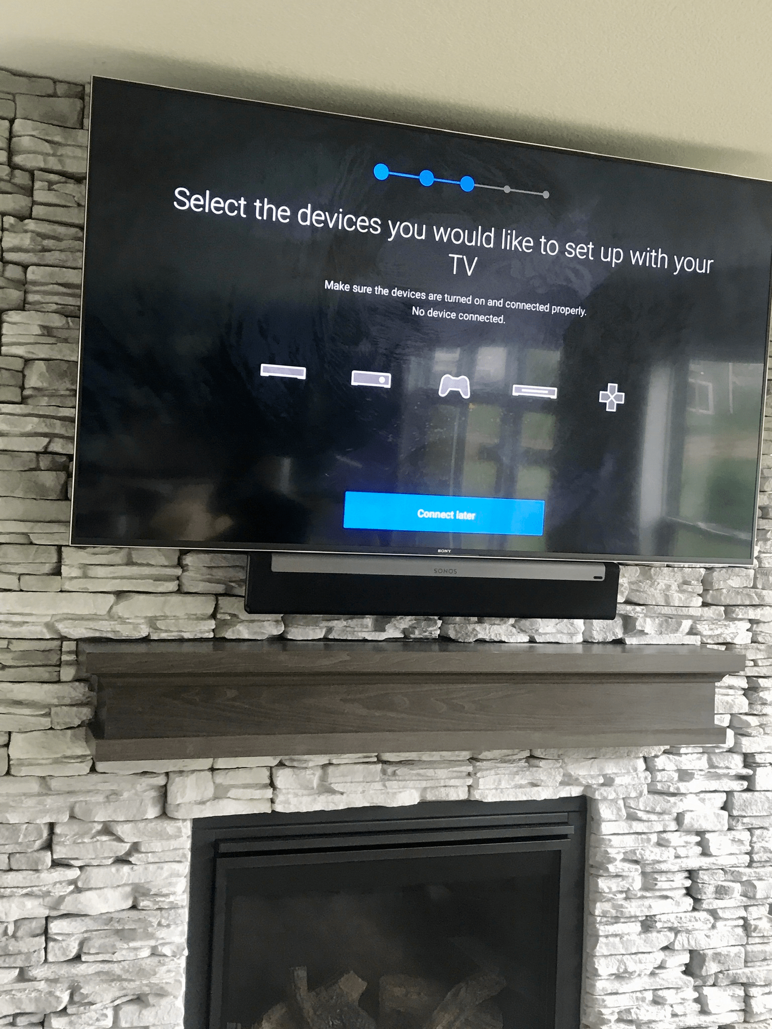 Clean, organized wall-mounted TV setup.