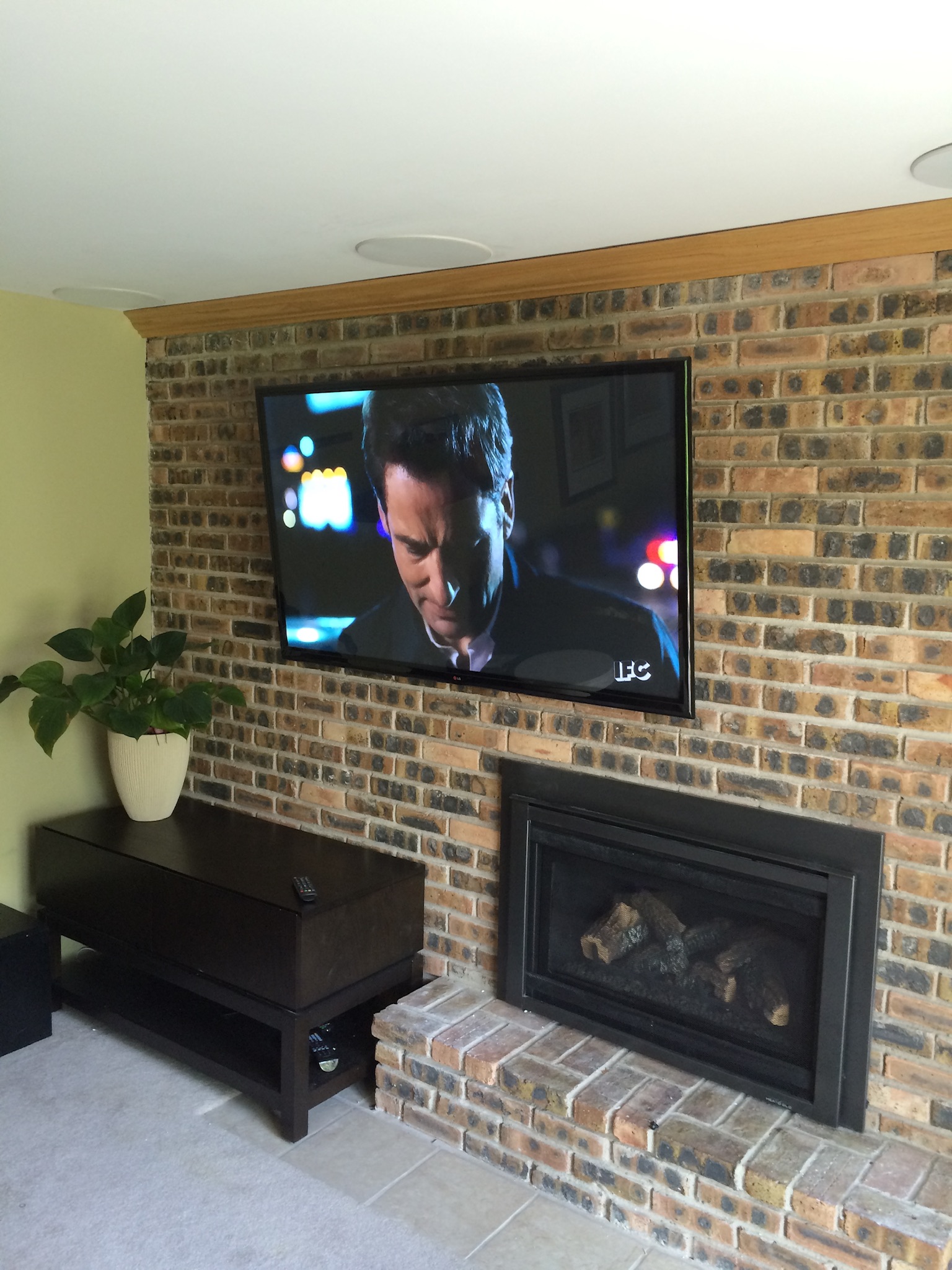 Sleek, modern TV mount in a living space.